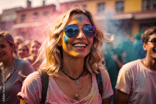 Girl at a Holi festival in India, covered in colorful powder, happy, enjoying the moment at the party, with friends