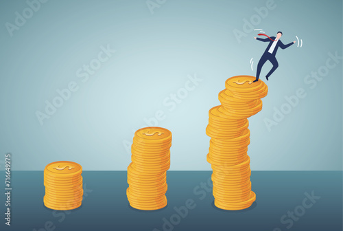 Financial instability concept. Uncertainty or unstable investment market, risky situation, economic recession, crisis or bankruptcy, businessman investor falling from stack of unstable money coins.