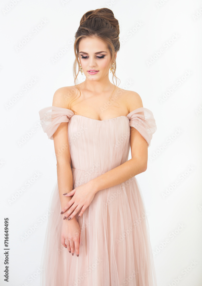 Young pretty bride wearing wedding dress indoors Young pretty bride wearing wedding dress indoors