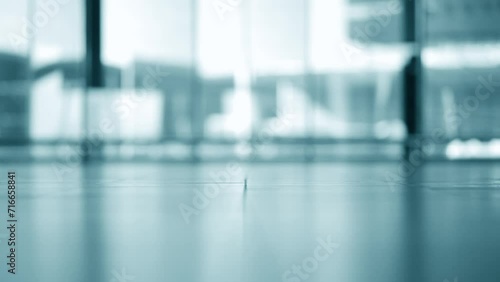 Selective focus silhouette of people at airport terminal 