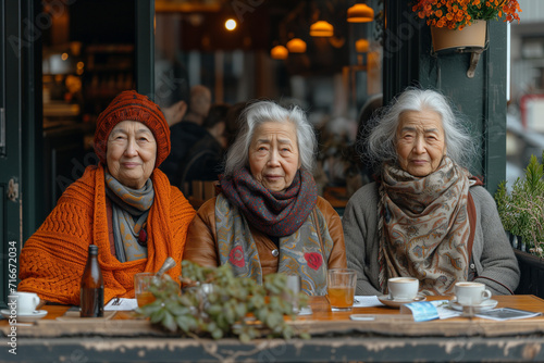 Asian Eldery women  enjoyng weather outside in cafe. Grandmother day  International Women s Day
