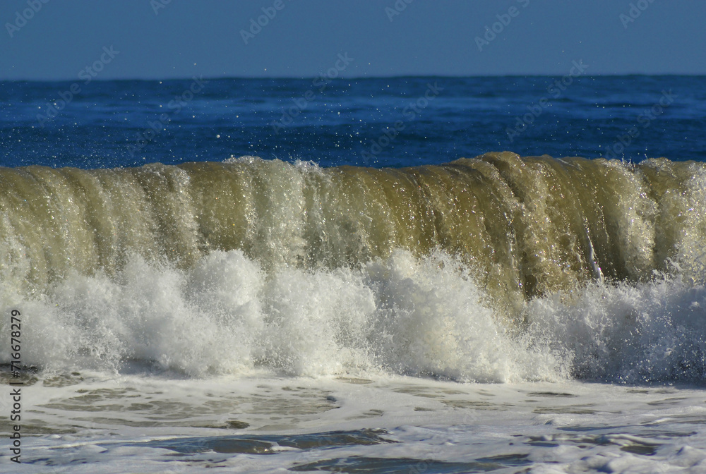 a beautiful wave on a beach in the Caribbean Sea