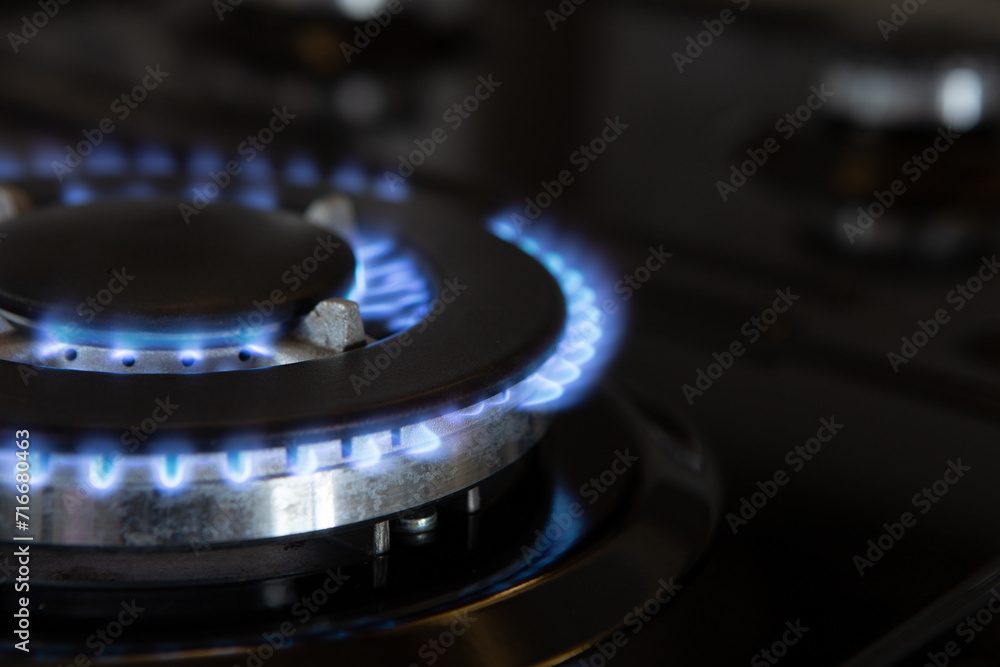 gas stove closeup - gas energy saving concept, energy crisis gas stove closeup - gas energy saving concept, energy crisis