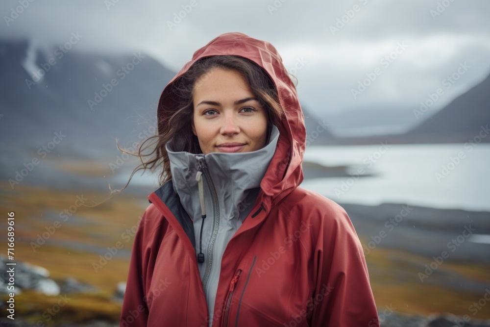 Portrait of a tender woman in her 30s wearing a lightweight packable anorak against a backdrop of an arctic landscape. AI Generation Portrait of a tender woman in her 30s wearing a lightweight packable anorak against a backdrop of an arctic landscape. AI Generation