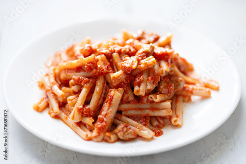 italian sausage cavatelli pasta in tomato sauce