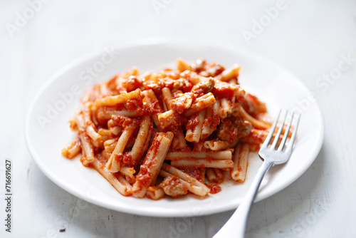 italian sausage cavatelli pasta in tomato sauce