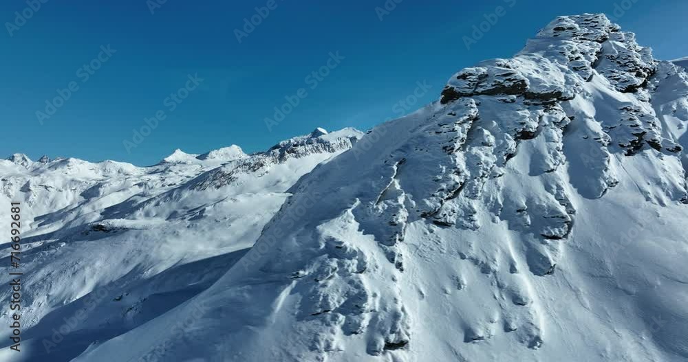 Winter drone shot of ski pistes and slopes covered with fresh powder snow in Tignes in Valdisere France Winter drone shot of ski pistes and slopes covered with fresh powder snow in Tignes in Valdisere France