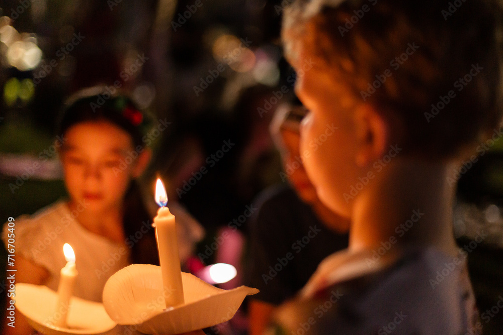 kids holding real candles at carols by candlelight kids holding real candles at carols by candlelight