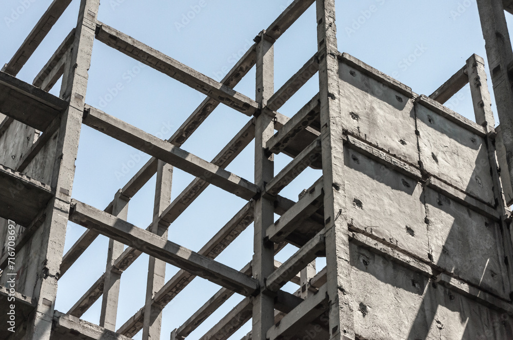 abstract background fragment of a building from concrete blocks on a light background abstract background fragment of a building from concrete blocks on a light background