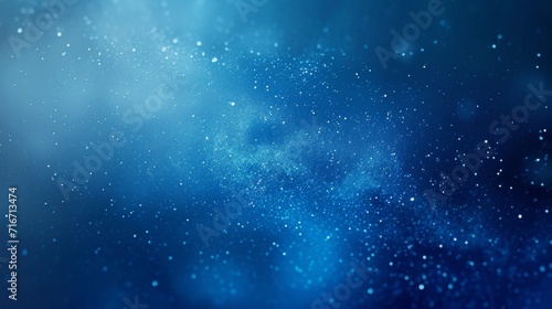 Abstract gradient background with a blend of deep blue to light blue hues, resembling sapphire with subtle glitter effects background © furyon