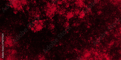 Defocused Lights and Dust Particles with soft Red clouds painted texture grungy design. Dark grunge red concrete . Grungy red canvas background or texture.