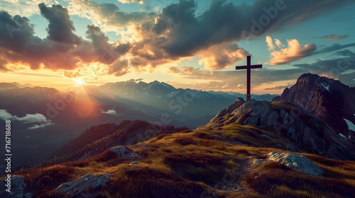 Beautiful sunset landscape background with crosses between mountains. photo