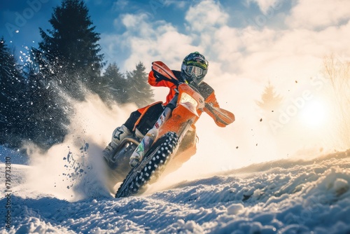Athlete on a snowmobile moving in the mountains at high speed. Motocross. Enduro. Extreme sport concept.