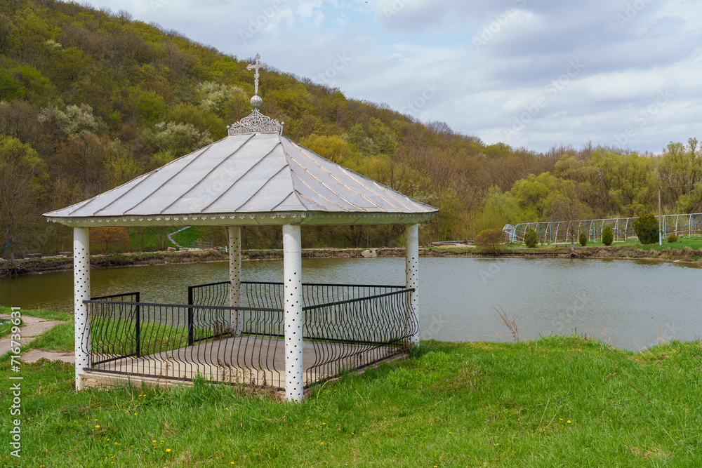 Lake with gazebo. Background with selective focus and copy space