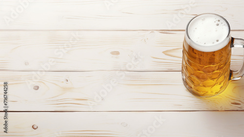 Refreshing Cold Beer Mug on White Wooden Table – Top View with Copyspace for Promotional Content