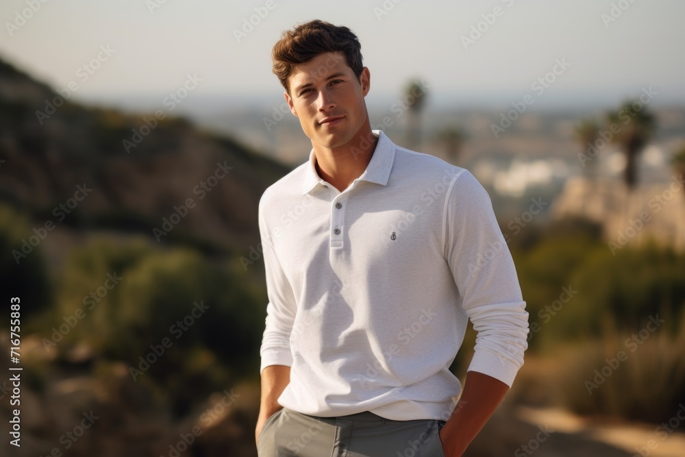 Portrait of a blissful man in his 20s wearing a breathable golf polo against a rocky shoreline background. AI Generation Portrait of a blissful man in his 20s wearing a breathable golf polo against a rocky shoreline background. AI Generation