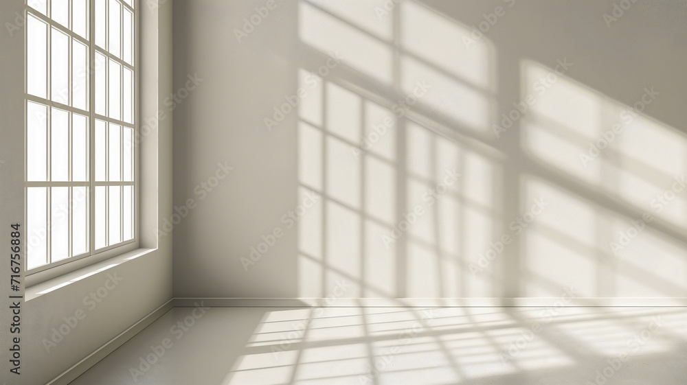 an empty room with the sun beaming in through the window. an empty room with the sun beaming in through the window.