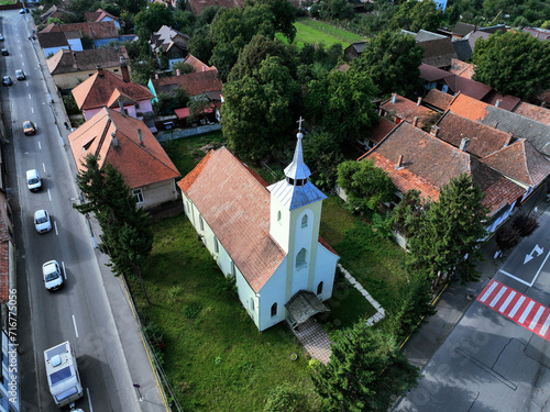 An aerial view of St. Anton de Padova Roman-Catholic church located in the town of Zărnești, Braşov County, Romania.