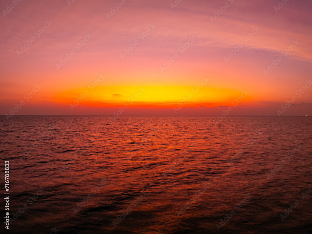 Landscape Sunset sky,Nature beautiful Light Sunset or sunrise over sea,Colorful dramatic majestic scenery sunset Sky with Amazing clouds and waves in sunset sky,Nature light cloud background
