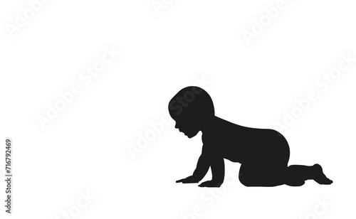 Black silhouette, crawling child. White isolated background photo