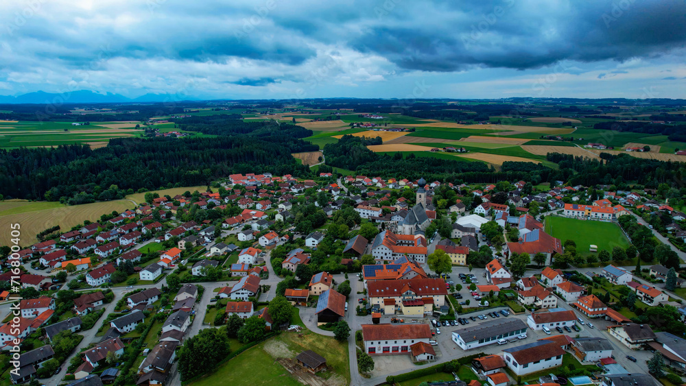Aerial around the village engelsberg in Germany on a cloudy day in late summer