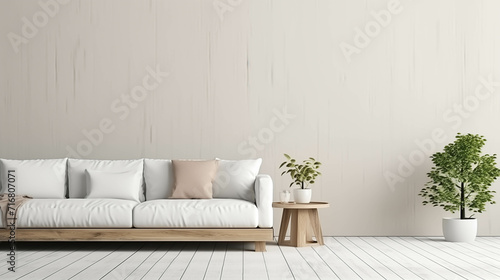 A white-toned living room with a sofa and plants.