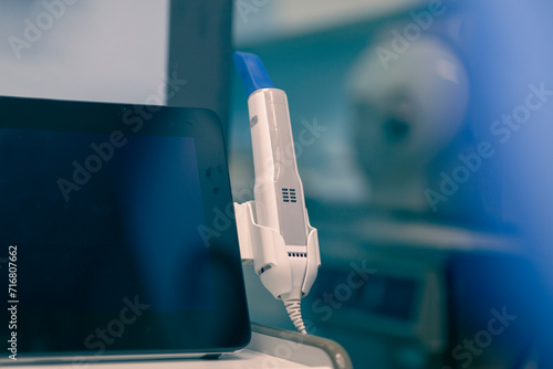 Close up on dentist tools, background is blurred and depth of field is shallow. photo