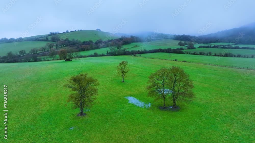 Countryside between fogs in Untzaga in the surroundings of the Nervión Waterfall. Aerial view from a drone. Untzaga. Alava. Basque Country. Spain. Europe Countryside between fogs in Untzaga in the surroundings of the Nervión Waterfall. Aerial view from a drone. Untzaga. Alava. Basque Country. Spain. Europe