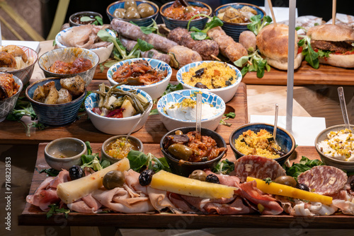 Fototapeta Naklejka Na Ścianę i Meble -  Palermo, Sicily, Italy A display of Italian antipasto dishes on a board.