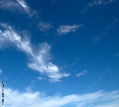 Fototapeta Naklejka Na Ścianę i Meble -  White fluffy clouds in the blue sky.