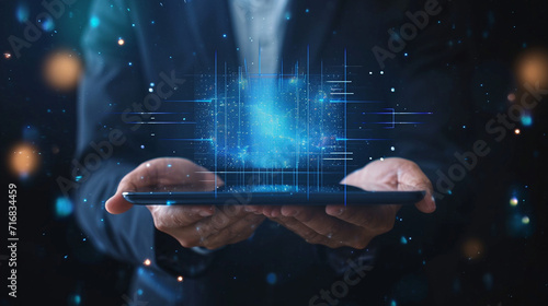 A holographic balance sheet floating above a tablet in a businessman's hands, business, dynamic and dramatic compositions, with copy space