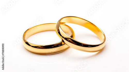 two_golden_rings_on_white_background