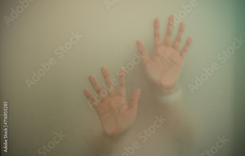 Blurry hand shadow behind mirror, Illustration of designer