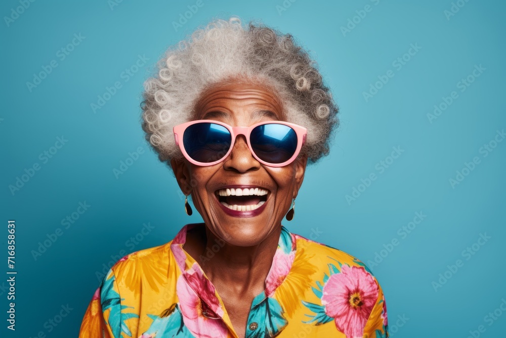 Portrait of a cheerful afro-american elderly woman in her 90s sporting a breathable mesh jersey against a blank studio backdrop. AI Generation Portrait of a cheerful afro-american elderly woman in her 90s sporting a breathable mesh jersey against a blank studio backdrop. AI Generation