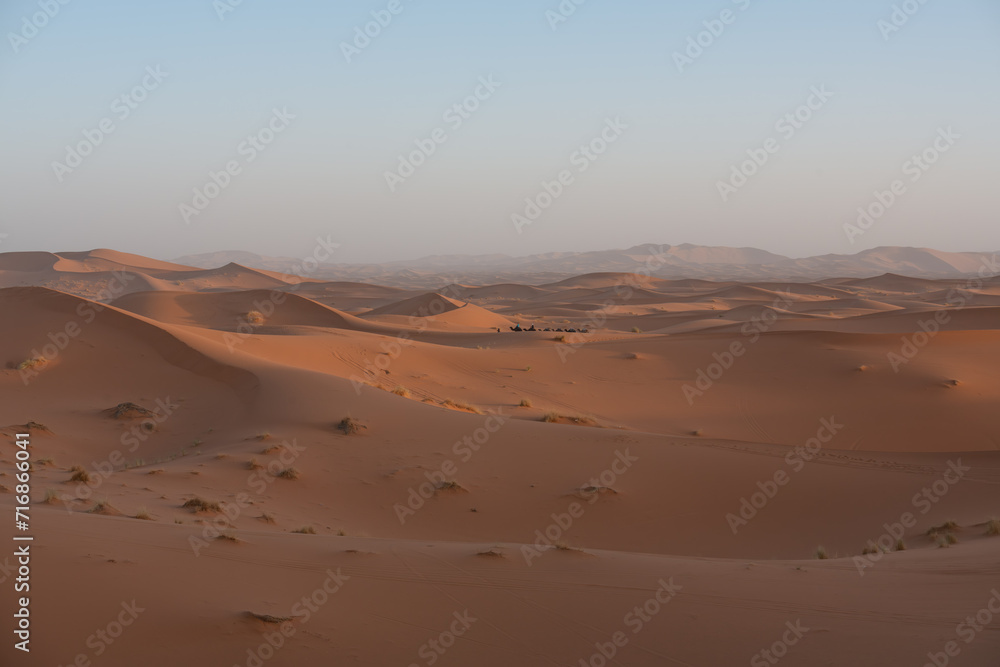 Serene dunes of Erg Chebbi at sunset, Merzouga, Morocco Serene dunes of Erg Chebbi at sunset, Merzouga, Morocco