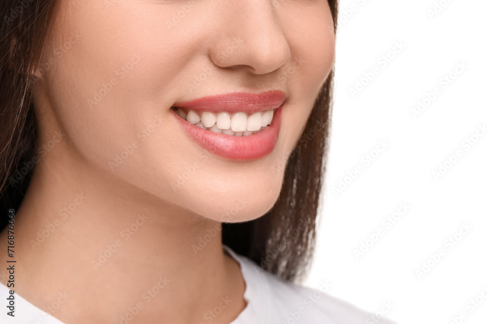 Woman with clean teeth smiling on white background, closeup Woman with clean teeth smiling on white background, closeup