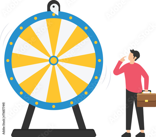 Life depends on luck, Fortune wheel randomness, Chance and opportunity to get a new job, investment winning or gambling, Looking at spinning fortune wheel

