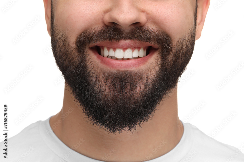 Man with clean teeth smiling on white background, closeup Man with clean teeth smiling on white background, closeup