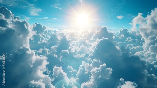 clouds and sun, a blue sky with clouds and the sun shining through the clouds in the center of the picture is a bright sun