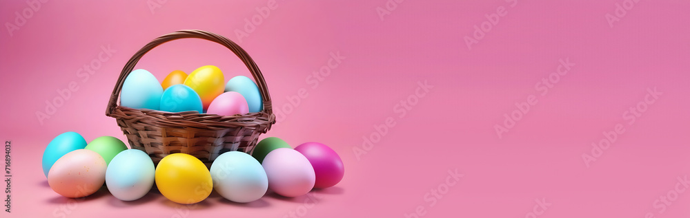 Basket with easter eggs on pink background, banner, copy space. Easter Card Basket with easter eggs on pink background, banner, copy space. Easter Card