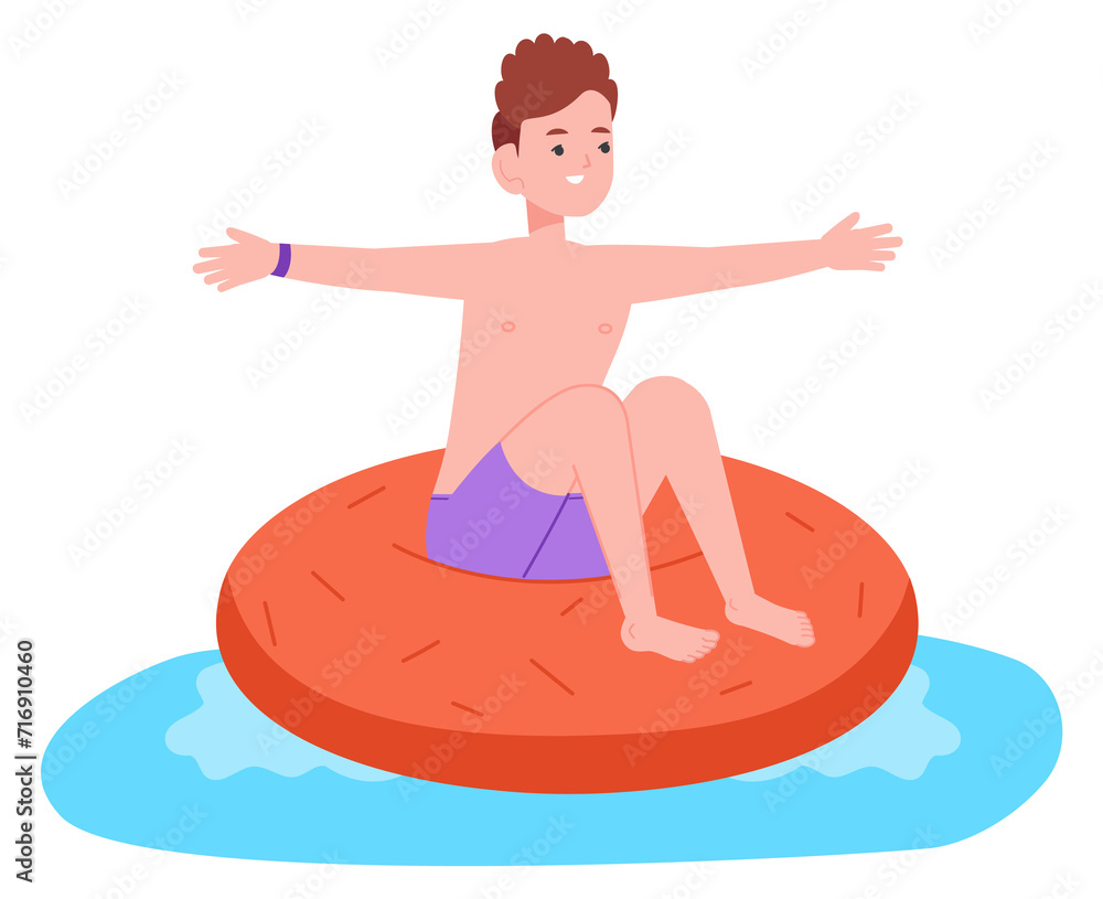 Smiling boy floating on swimming donut. Happy kid