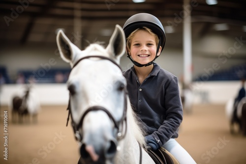 Portrait of an active kid male horse riding in a riding school. With generative AI technology