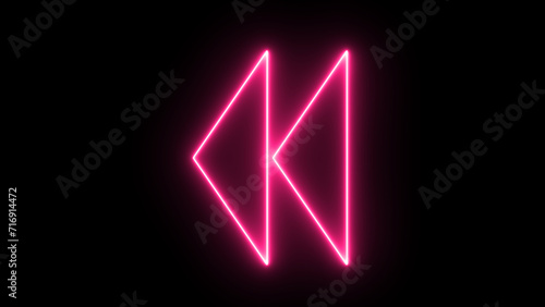 Linear neon animation of blue and pink rewind button on black background. Motion graphic.