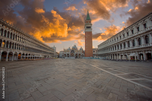 Venice, Italy. St. Mark's Square(Piazza din San Marco) with the Basilica and Bell Tower at sunrise. © Marius Igas