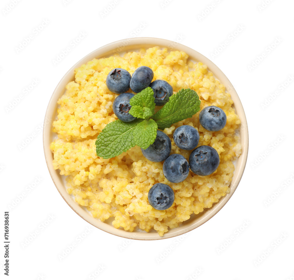 Tasty millet porridge with blueberries and mint in bowl isolated on white, top view Tasty millet porridge with blueberries and mint in bowl isolated on white, top view