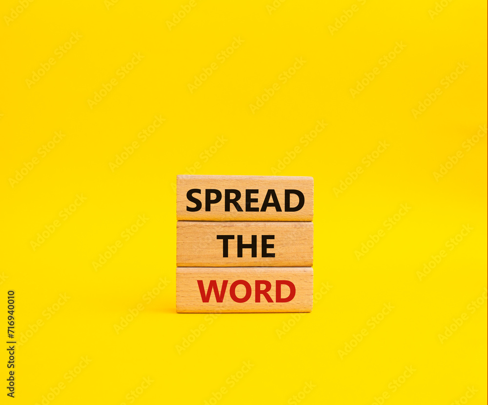 Spread the Word symbol. Concept words Spread the Word on wooden blocks. Beautiful yellow background. Business and Spread the Word concept. Copy space. Spread the Word symbol. Concept words Spread the Word on wooden blocks. Beautiful yellow background. Business and Spread the Word concept. Copy space.