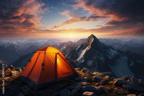 Tent on a mountain peak with sunset © Michael Böhm