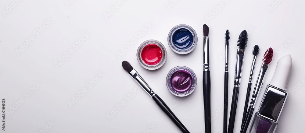 Manicure tools and nail polish on a white background. Manicure tools and nail polish on a white background.
