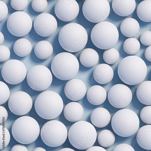 White Spheres in different sizes with a rough surface on a blue plane. Seamlessly tileable image.