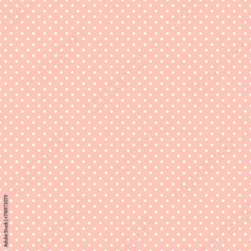 Pink and white polka dot pattern, seamless texture background. Minimal fashionable design. Polka dots trendy background, tile. For fabric pattern, card, decor, wrapping paper